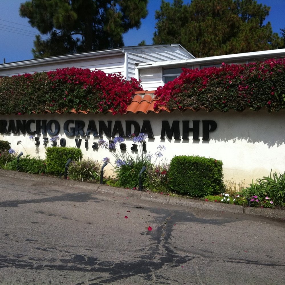 Tropical Gardens Mobile Home Park in Santa Barbara, CA - showcasing well-maintained community amenities and vintage trailer setting